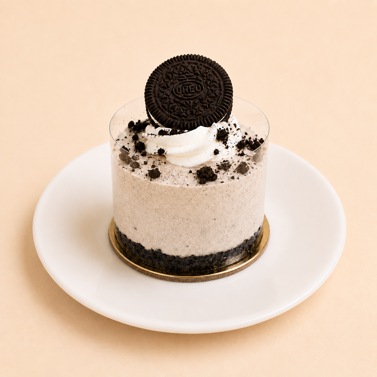Individual Oreo cake with cookies-and-cream mousse and a whole Oreo on top